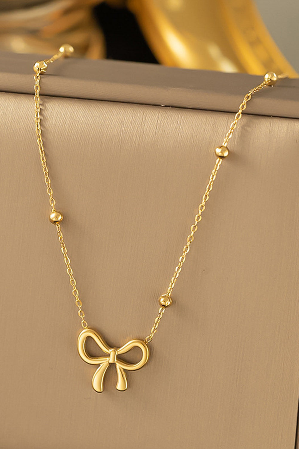 Gold Bowknot Pendant Necklace